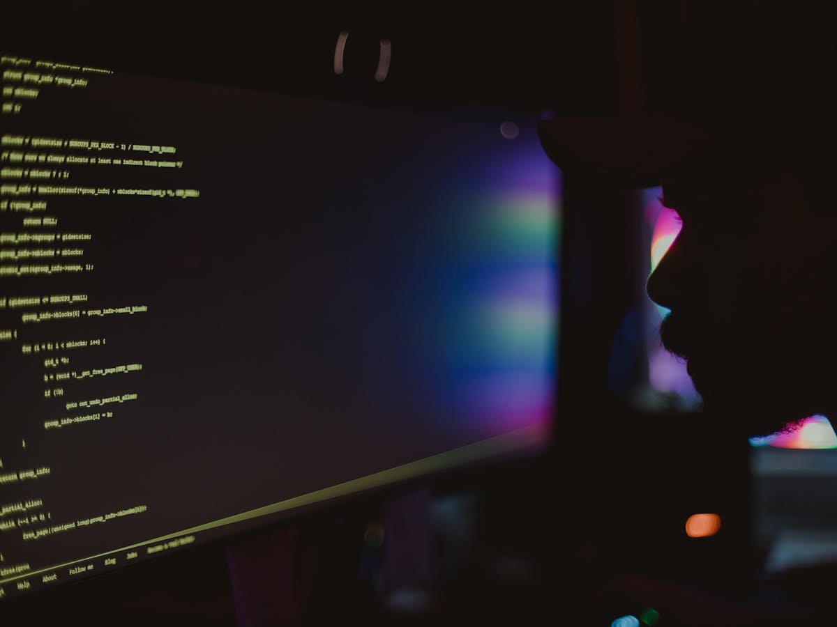 A developer working late, the cost of building inbound email plumbing in-house.